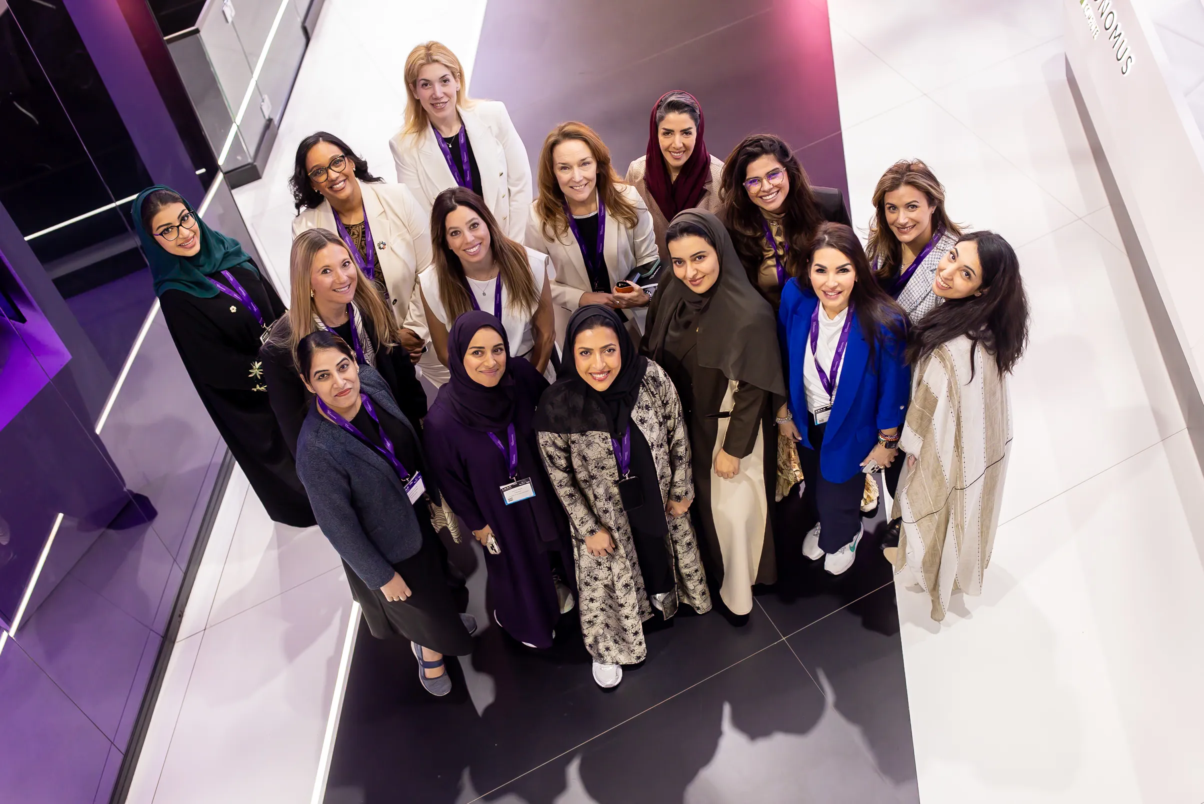 Women of the Tonomus team gathered for a group photograph at the stand