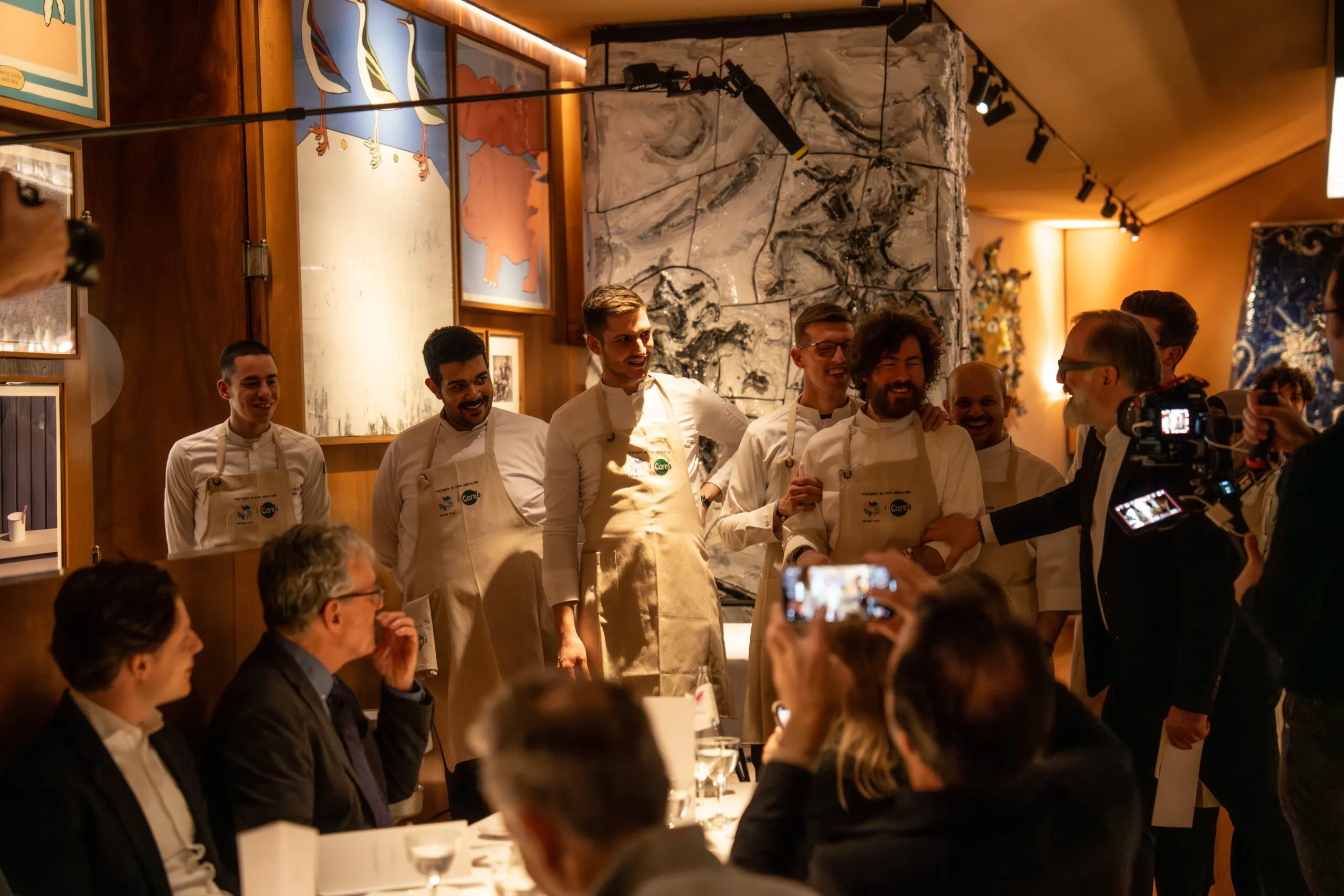 The chefs' brigade presented to applauding diners at the launch dinner