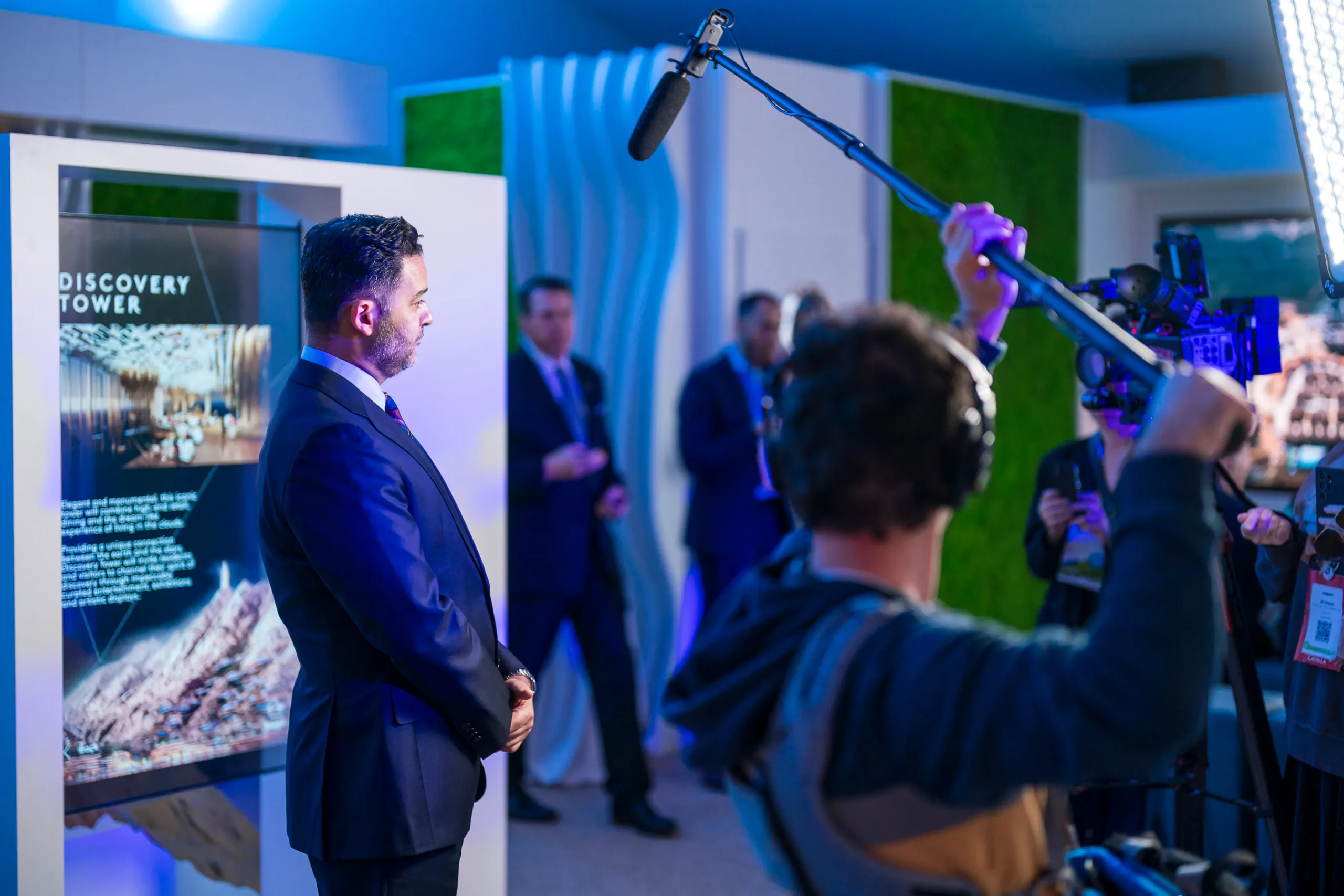 A television interview being filmed beside the Discovery Tower exhibit